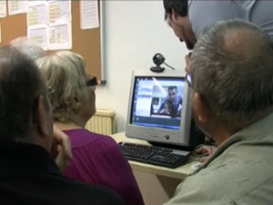 Imatge de participants d'un Punt TIC fent una videoconferència